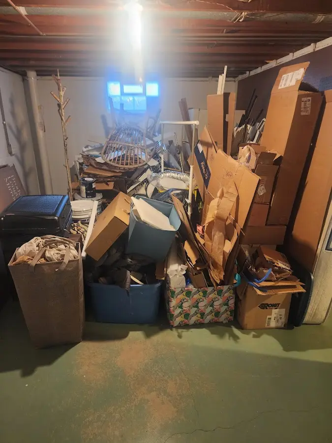 Roll-off dumpster container at job site for 4 Yard Dumpster Rental in Albia